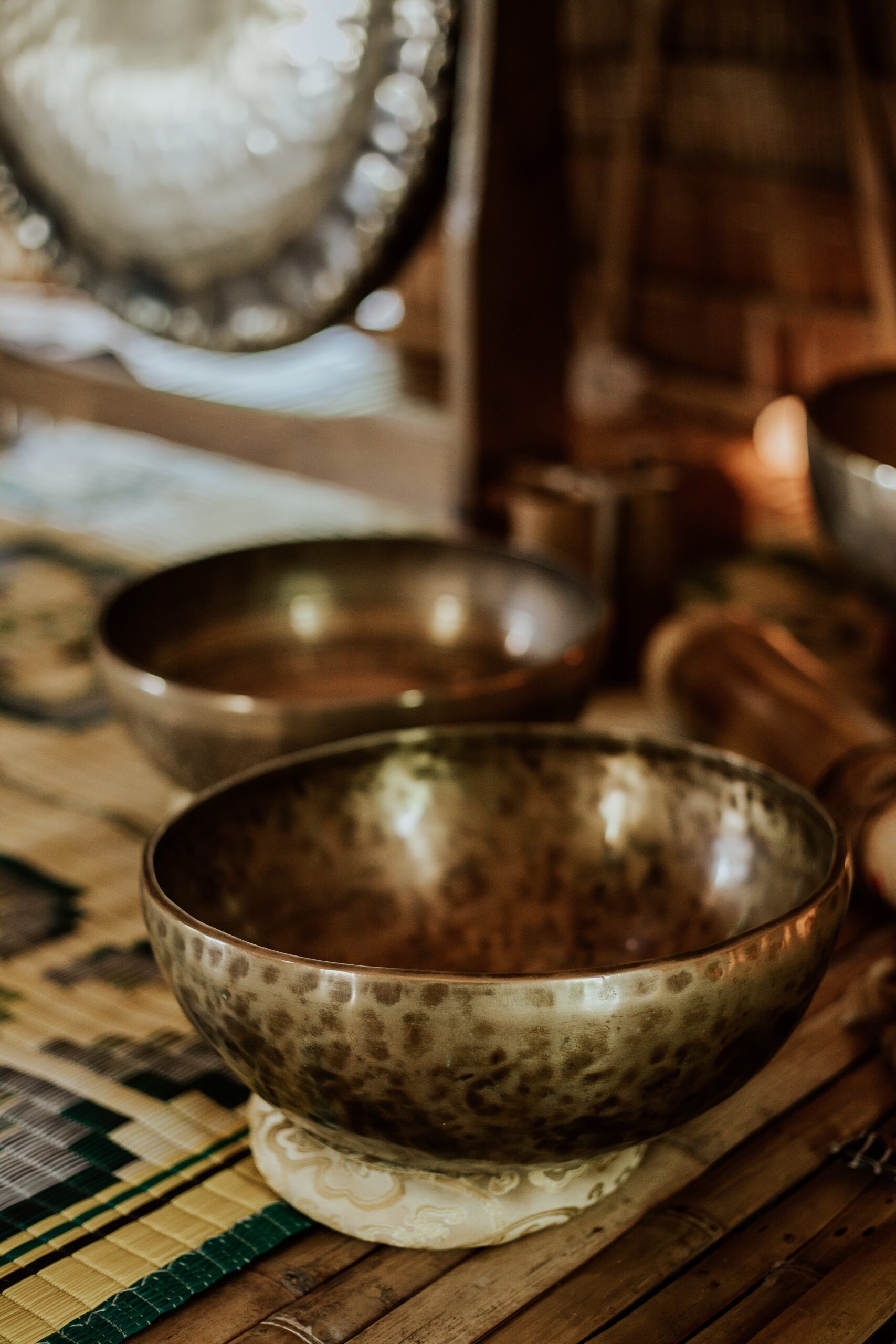 Two bronze metal bowls